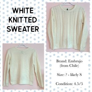 White knitted sweater
